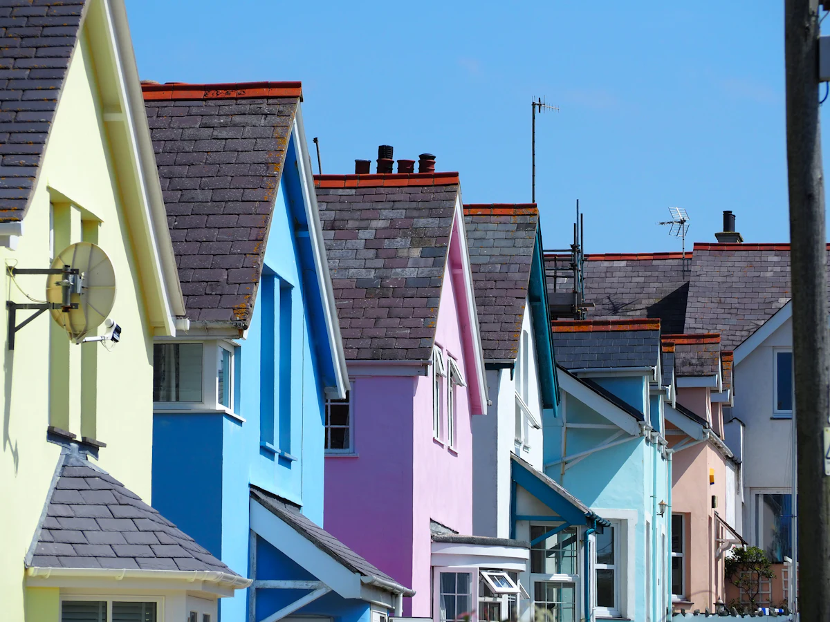Row of colourful terraced houses in a British town