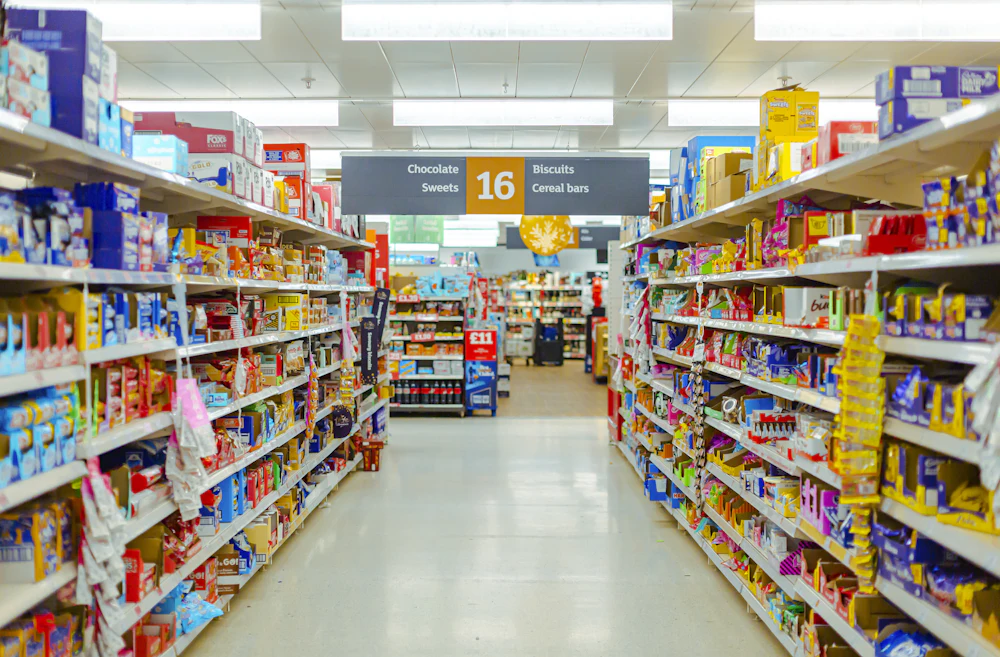 Packaged grocery products on store shelves